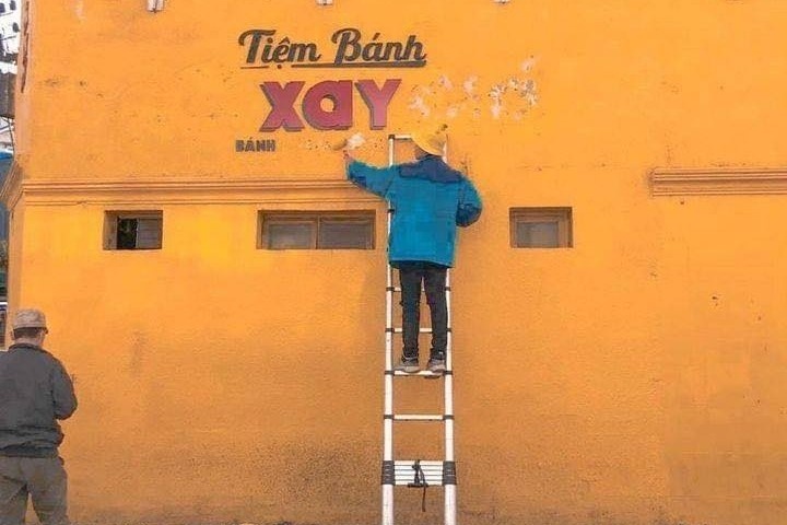 Hinh anh buc tuong vang o Da Lat bi xoa la gia hinh anh
