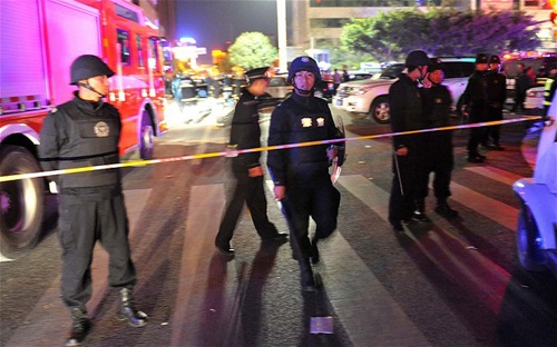 Tan cong dam mau tai nha ga Trung Quoc, 33 nguoi chet hinh anh