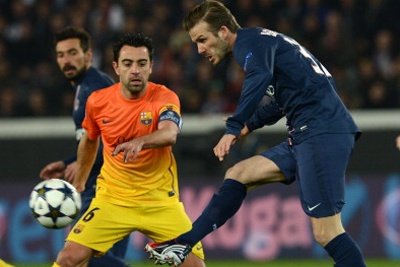 Sau Ronaldo, Beckham muon dua Xavi sang My hinh anh