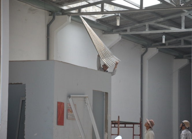 Gia dinh ong Tran Van Truyen thao do nha kho hinh anh