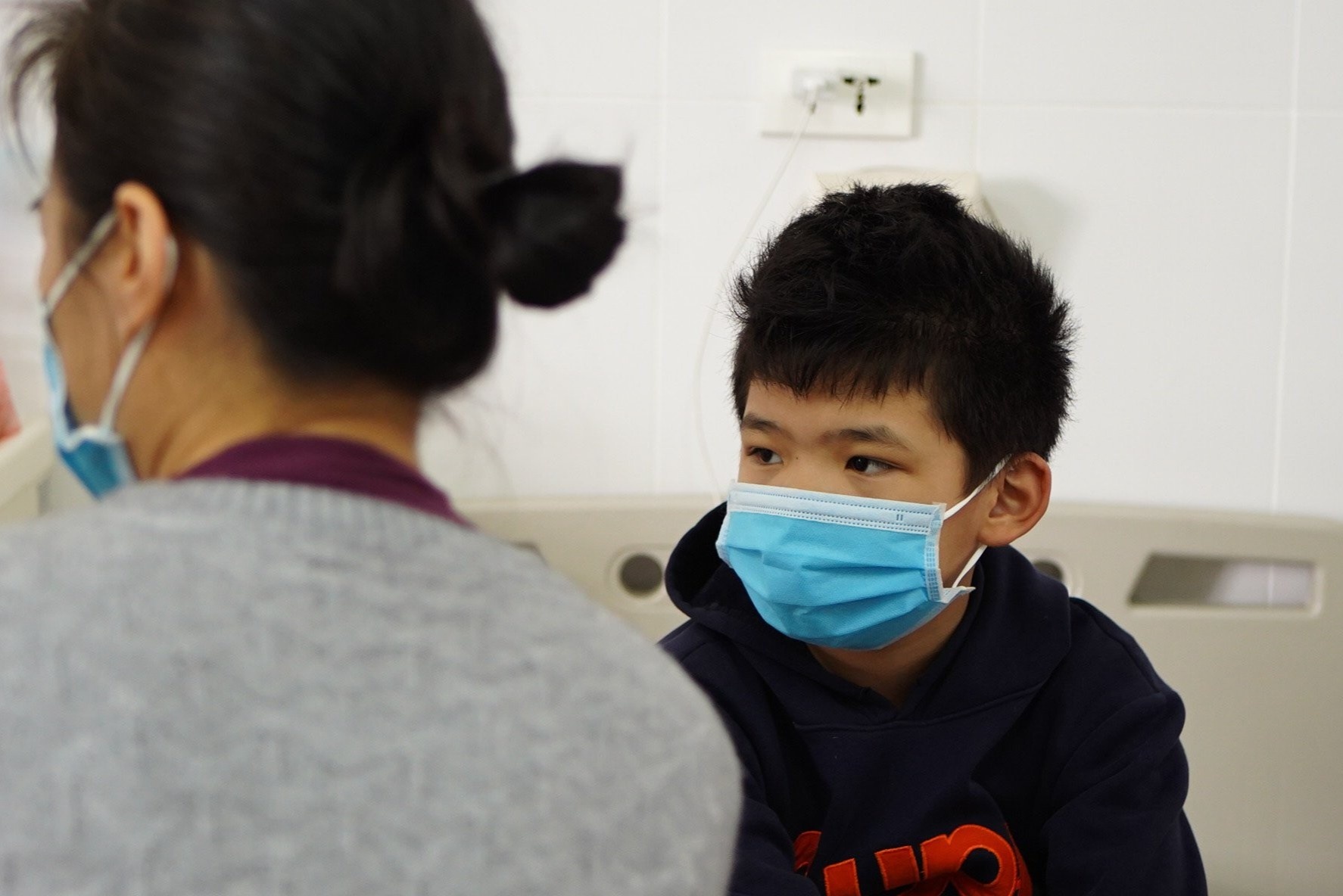 Ban khoan cua cha me truoc quyet dinh tiem vaccine cho tre 5-11 tuoi hinh anh