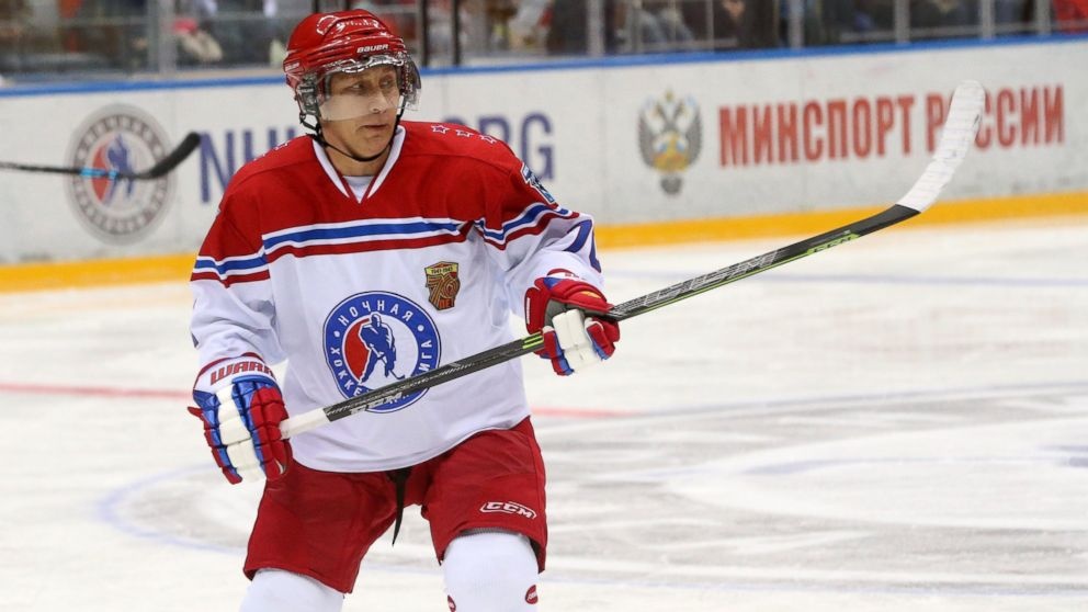 Putin dau khuc con cau cung cac quan chuc hinh anh