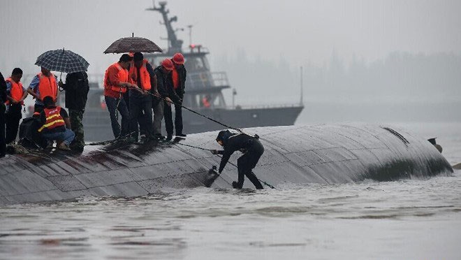 Nguyen nhan tau cho 458 nguoi lat o Trung Quoc hinh anh