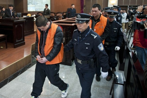 Những thành viên trong một đường dây buôn bán nội tạng ở Trung Quốc ra hầu tòa. Ảnh: ImageChina