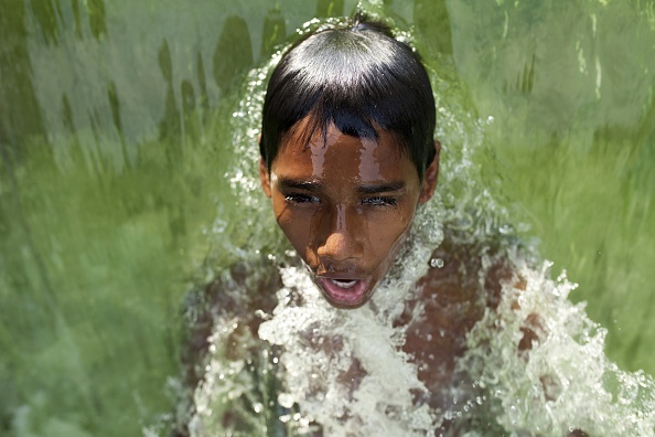 Nang nong gay gat o chau A lam hon 300 nguoi chet hinh anh