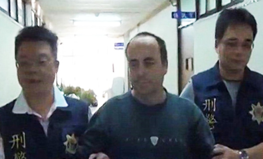 Bi cao dung keo tu tu ngay giua phien toa o Dai Loan hinh anh