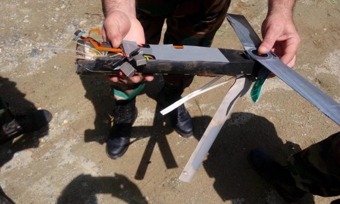 Syria ‘khoe’ anh ban may bay do tham khong nguoi lai cua My hinh anh