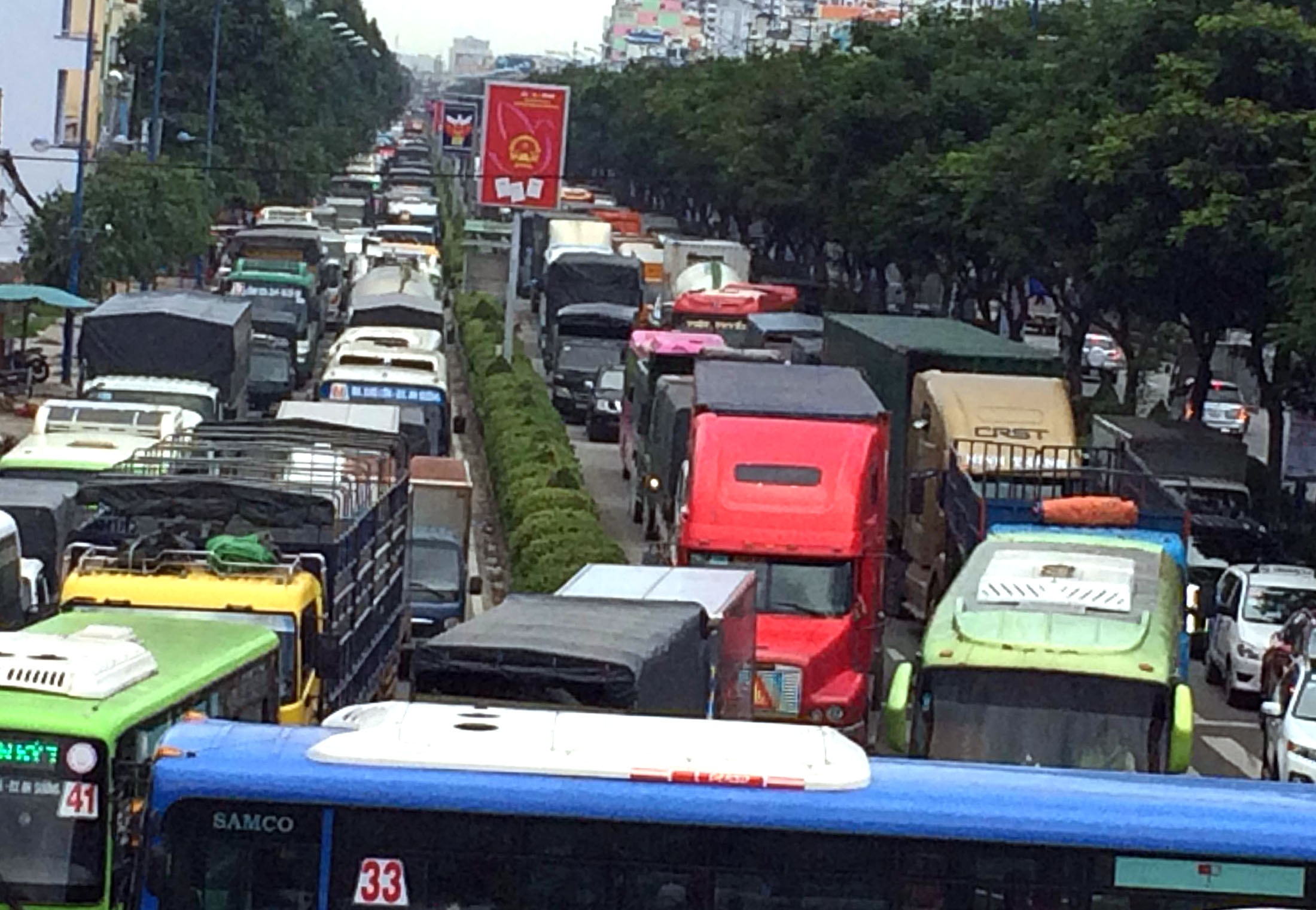 Xe tai can chet nguoi phu nu, nga tu An Suong te liet 2 gio hinh anh