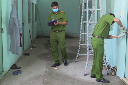 Nguoi phu nu o Sai Gon nghi bi sat hai trong phong ngu hinh anh
