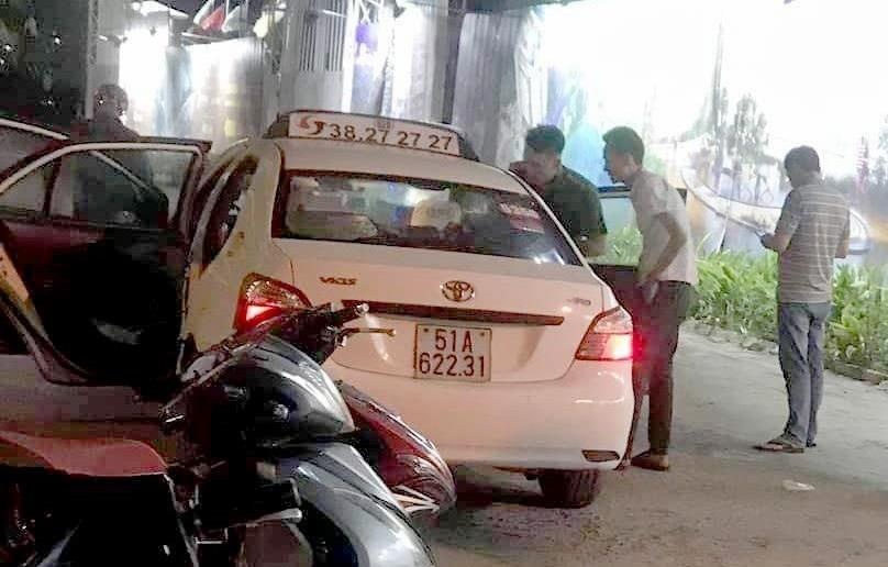 Tai xe taxi nghi bi cuop cat co o Sai Gon hinh anh