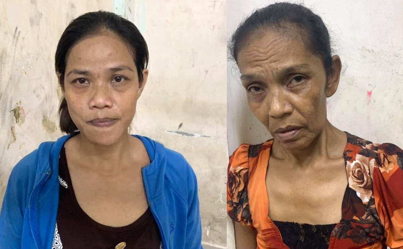 Trinh sat mat phuc bat 2 'nu quai' moc tui o pho Tay Bui Vien hinh anh