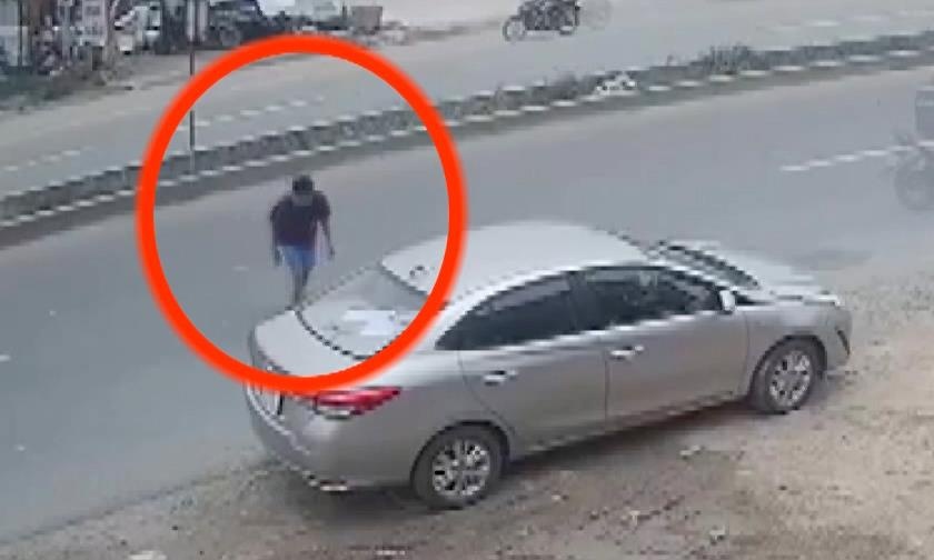 Camera ghi canh nam thanh nien trom oto hinh anh