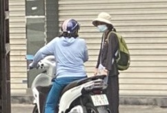 Mat phuc bat ke chuyen lua nguoi gia o TP.HCM hinh anh