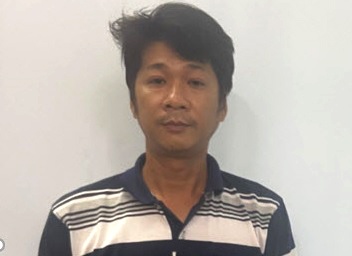 Nguoi dan ong bi bat sau 26 nam tron truy na hinh anh