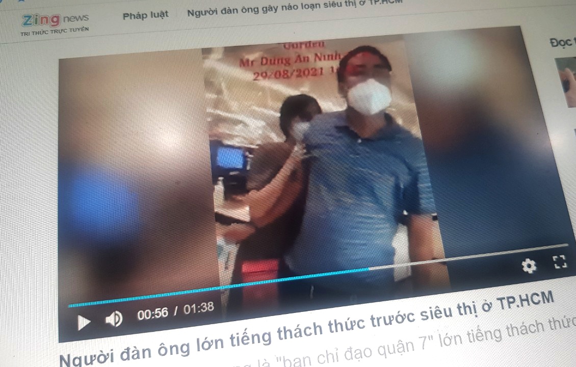 Khoi to nguoi dan ong gay nao loan sieu thi o quan 7 hinh anh