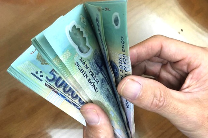 Khoi to nguoi an chan tien ho tro dan dot dich Covid-19 hinh anh