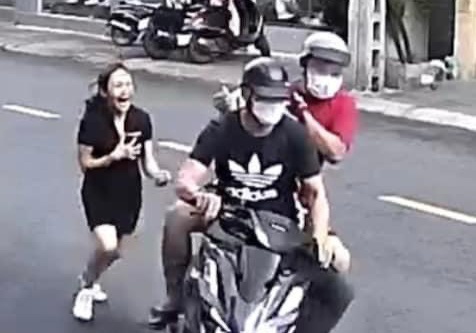 Co gai bi giat vi tien, dien thoai o TP.HCM hinh anh