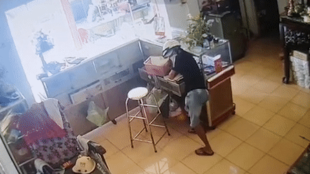 Camera ghi lai hanh dong cua nguoi trom vang hinh anh