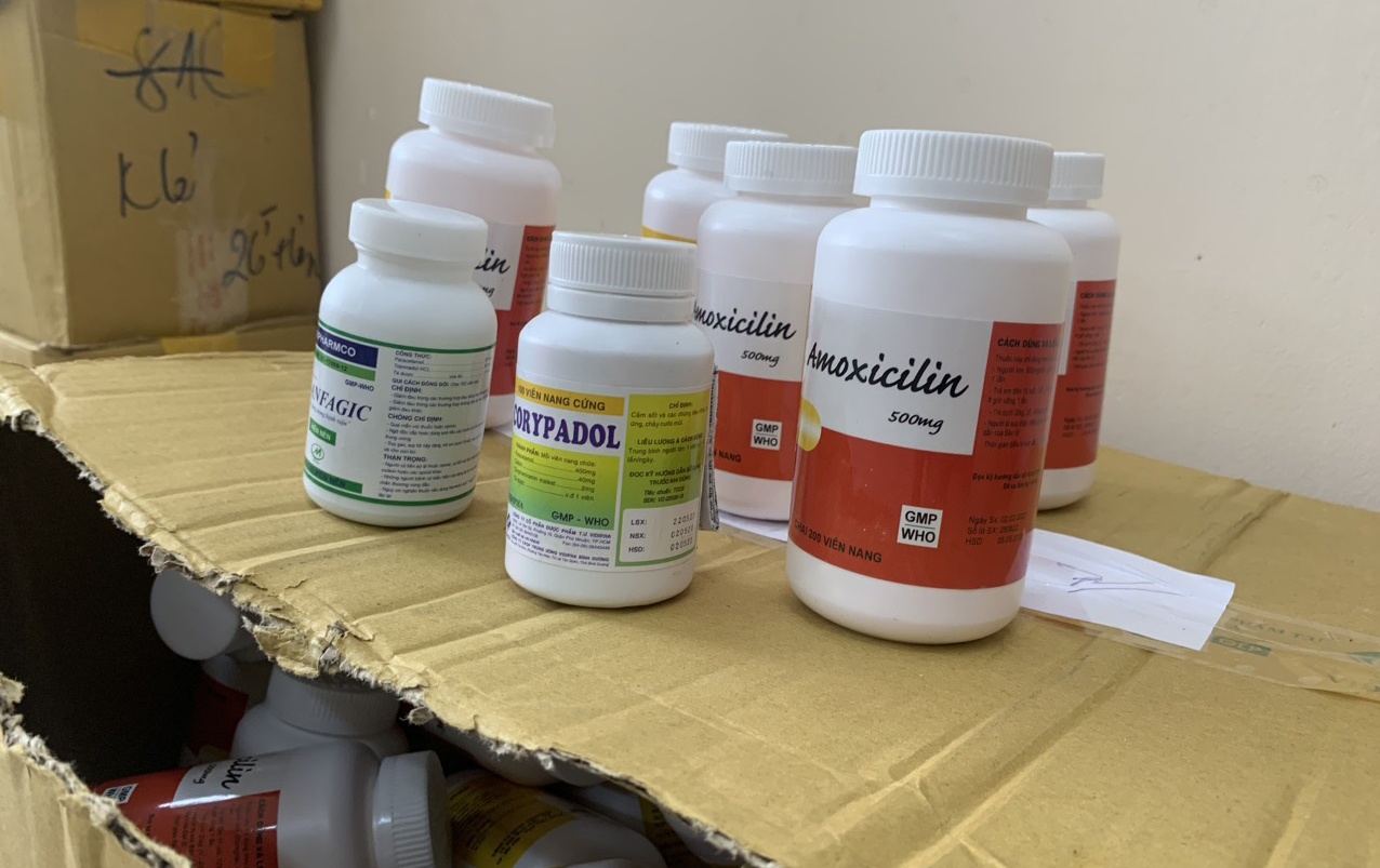 Thu giu gan 20.000 hop thuoc chua benh gia o Dong Nai va TP.HCM hinh anh