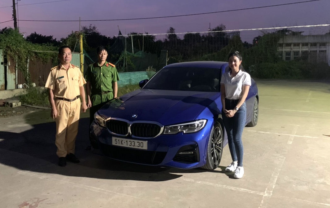 Tam giu oto BMW trong vu co gai lai xe toc do 140 km/h o TP.HCM hinh anh