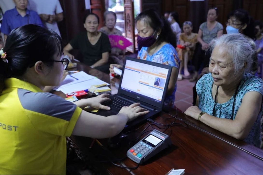 Ha Noi chi tra luong huu, tro cap 2 thang lien vao ky chi tra thang 1 hinh anh