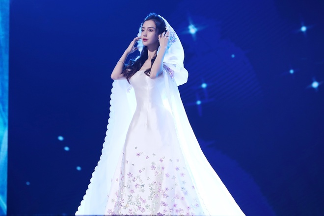 Huynh Hieu Minh va Angelababy gop 200.000 nhan dan te cho Vu Han anh 2