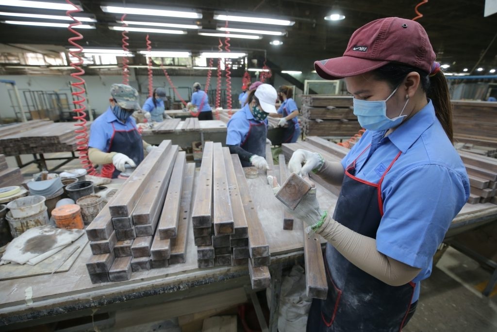 Doanh nghiep Viet chat vat vi lam phat o My va EU cao ky luc hinh anh