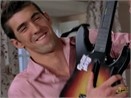 Michael Phelps quang ba game Guitar Hero hinh anh