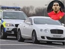Tevez bi canh sat ‘khoa’ xe hinh anh
