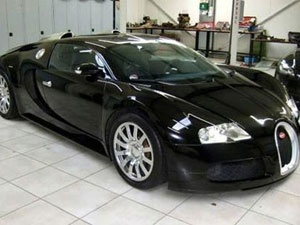 Jenson Button rao ban sieu xe trieu do hinh anh