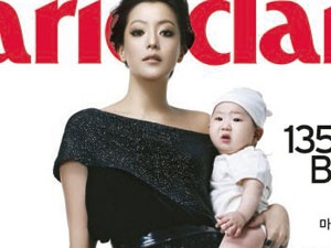 Kim Hee Sun lan dau khoe con tren bao hinh anh