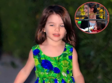 Katie Holmes bi chi trich vi cho Suri bu binh hinh anh