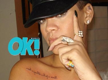 Rihanna khoe hinh xam moi tren nguc hinh anh