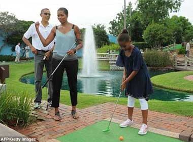 Nha Obama hao hung choi golf hinh anh