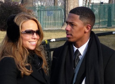 Tong thong My la nguoi dau tien biet Mariah Carey... sinh doi hinh anh