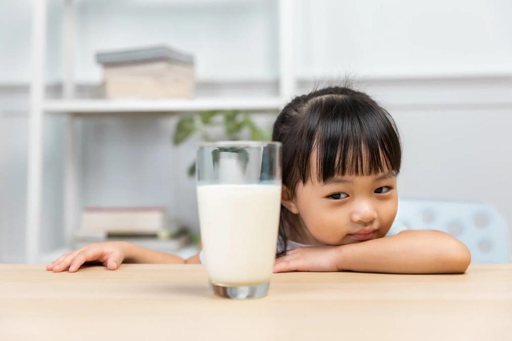 Sua rat tot, nhung khong phai uong cang nhieu cang co loi hinh anh