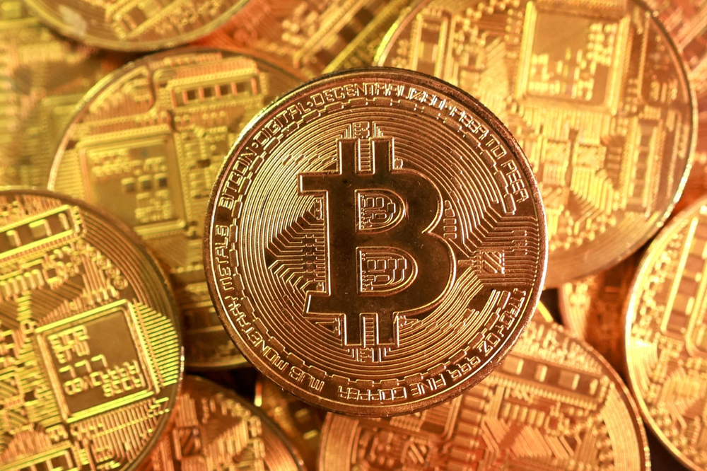 Yếu tố giúp vàng và Bitcoin bứt phá