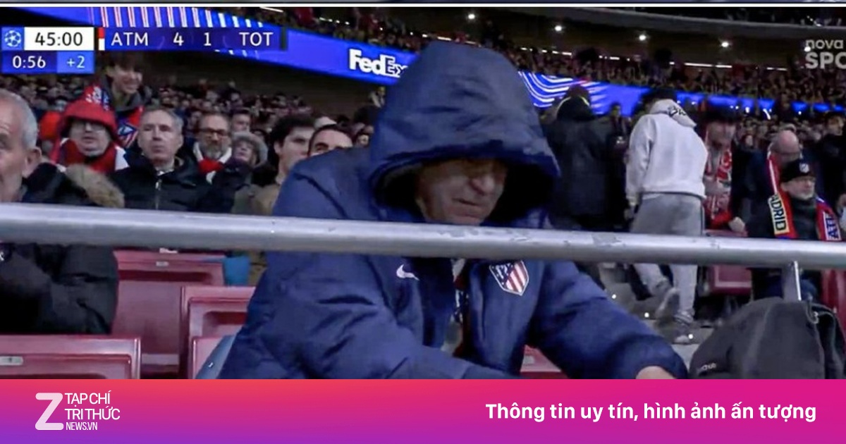 CĐV Atletico ung dung làm bánh mì trên khán đài