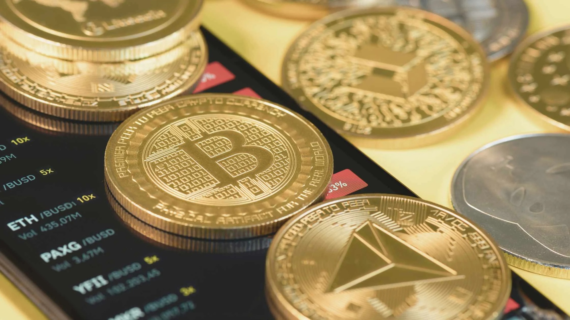 Crypto_20coins_20on_20a_20phone_20with_20open_20Bianance_20app_20_1_.jpg_width_2240_height_1260_name_Crypto_20coins_20on_20a_20phone_20with_20open_20Bianance_20app_20_1_.jpg