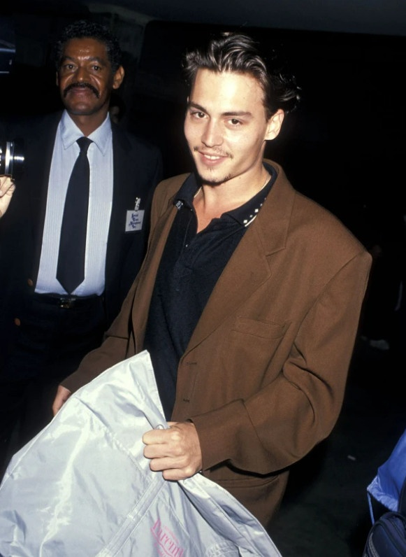 Johnny Depp at a press conference in 1989