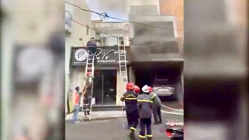 Cuu 6 nguoi chay TP.HCM anh 1