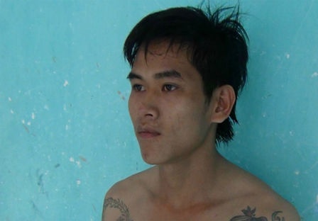  Kẻ côn đồ Nguyễn Hùng Minh khi bị bắt quả tang.