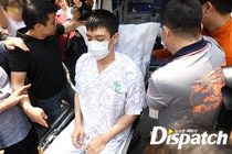 T.O.P (Big Bang) ngồi xe lăn, liên tục xin lỗi khi rời bệnh viện