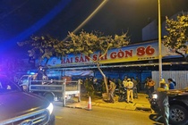 Bi phat nong do con, tai xe o TP.HCM goi nguoi den can tro CSGT hinh anh