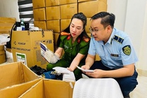 Cong an Ha Noi thu hon 100 tan thuc pham chuc nang, thiet bi y te gia hinh anh