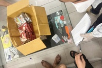 Bat giu 2 doi tuong mua ban, van chuyen hon 5,3 kg ma tuy hinh anh