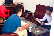 Nguoi to C.P. Viet Nam ban thit heo ban cung cap chung cu cho cong an hinh anh