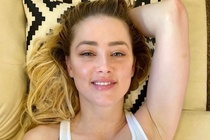 Amber Heard sinh doi hinh anh