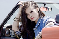 Dong Nhi khoe chan dai trong MV moi hinh anh