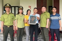 Phat hien cu li quy hiem trong vuon nha dan hinh anh